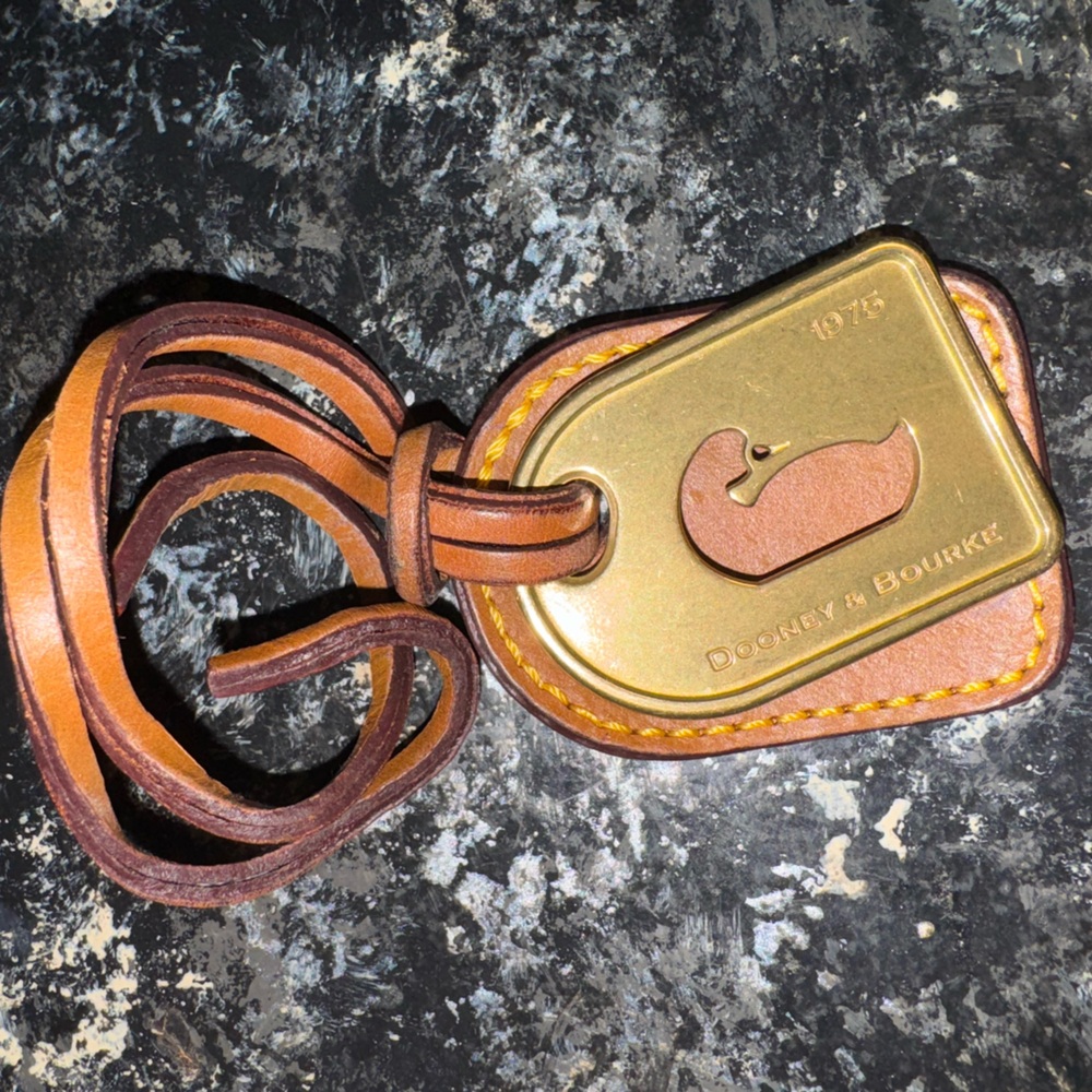 Dooney & Bourke Brown and Gold Leather Tag